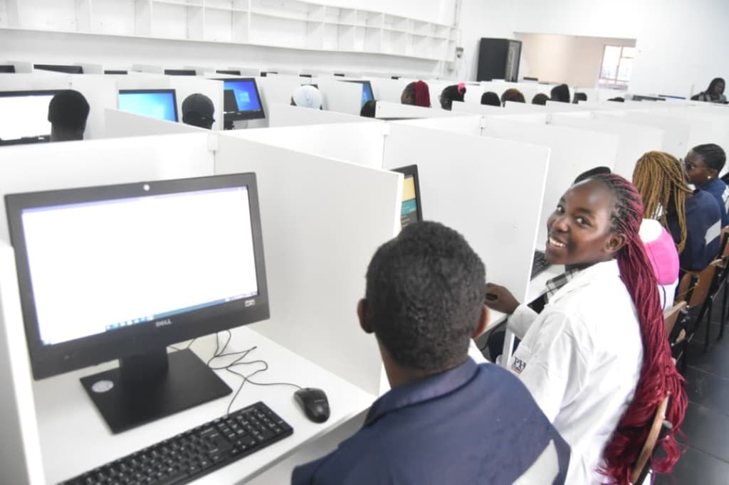 HIPH students at modern computer workstations